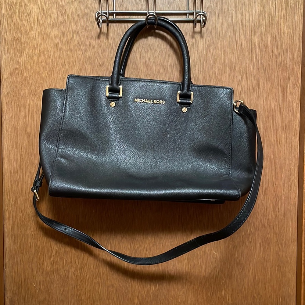 Black Michael Kors purse with long strap